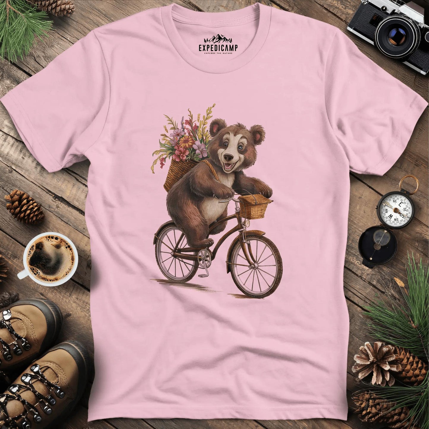 Bear on a Bike T-Shirt – Light Pink – Outdoor apparel for travel, hiking, camping, and nature lovers – ExpediCamp