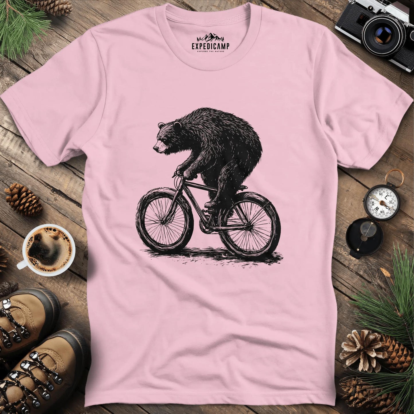 Bear Riding Bicycle T-Shirt – Light Pink – Outdoor apparel for travel, hiking, camping, and nature lovers – ExpediCamp