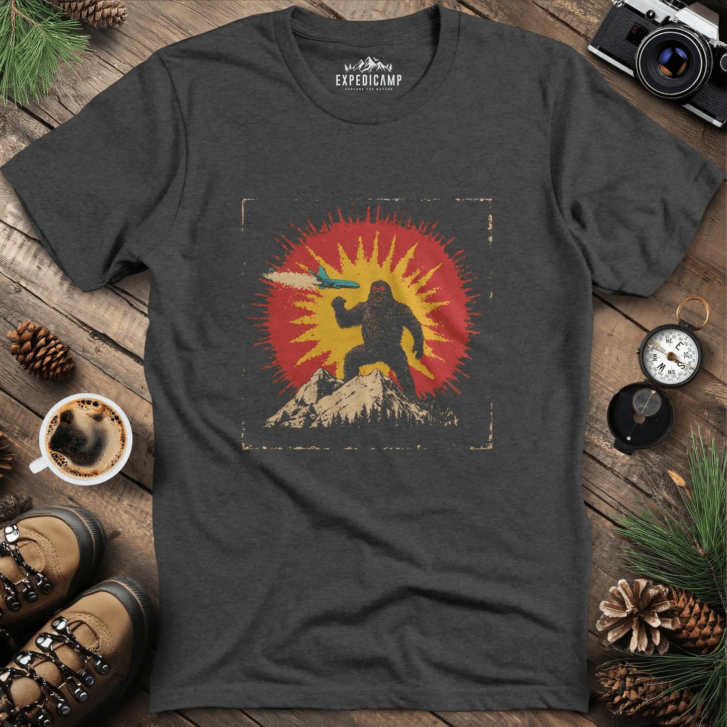Bigfoot vs. The Skies T-Shirt – Dark Heather – Outdoor apparel for travel, hiking, camping, and nature lovers – ExpediCamp