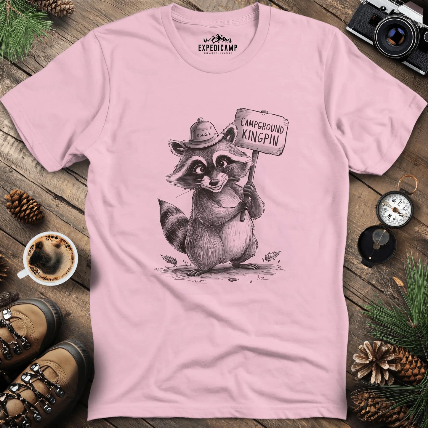 Campground Kingpin Raccoon T-Shirt – Light Pink – Outdoor apparel for travel, hiking, camping, and nature lovers – ExpediCamp