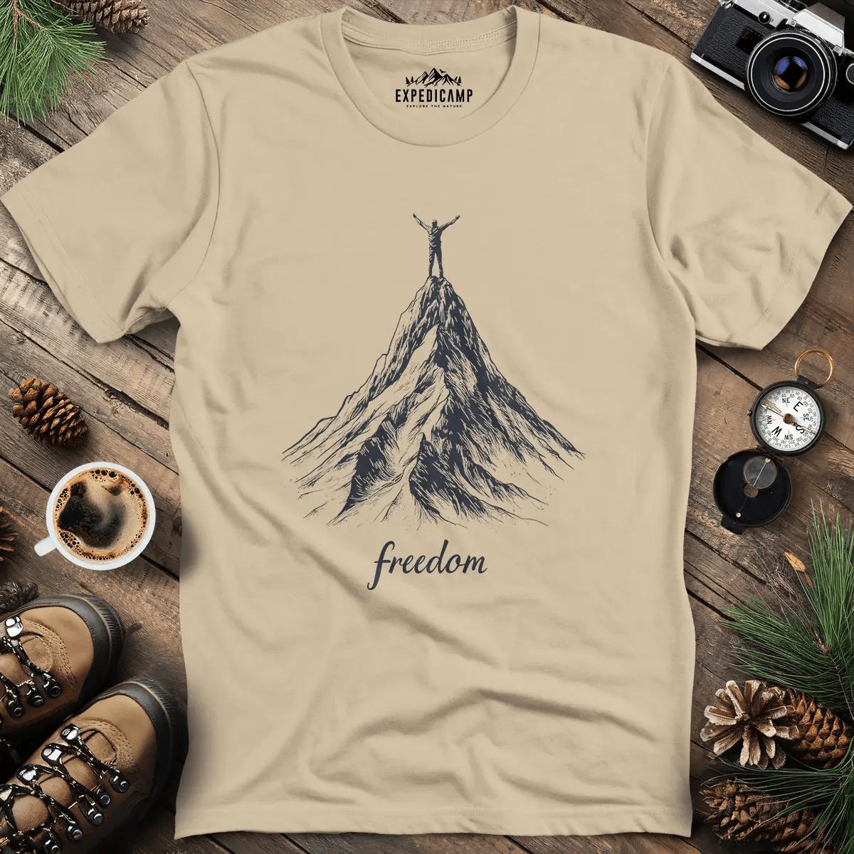 Freedom on the Mountain Peak T-Shirt – Sand – Outdoor apparel for travel, hiking, camping, and nature lovers – ExpediCamp