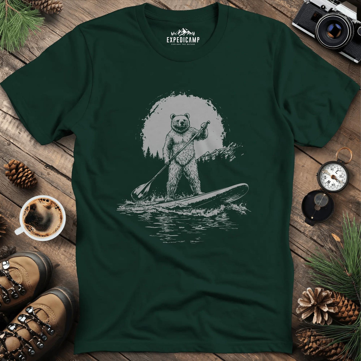 Sup Bear Paddleboarding Graphic T-Shirt – Forest Green – Outdoor apparel for travel, hiking, camping, and nature lovers – ExpediCamp
