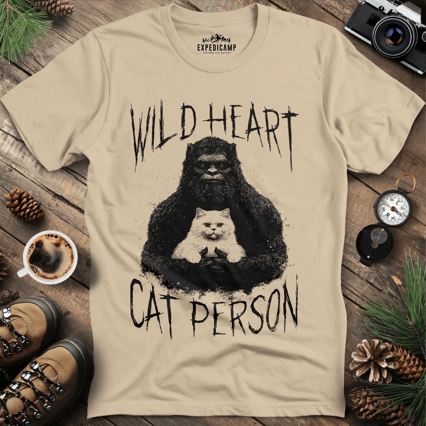 Wild Heart Cat Person Bigfoot T-Shirt – Sand – Outdoor apparel for travel, hiking, camping, and nature lovers – ExpediCamp