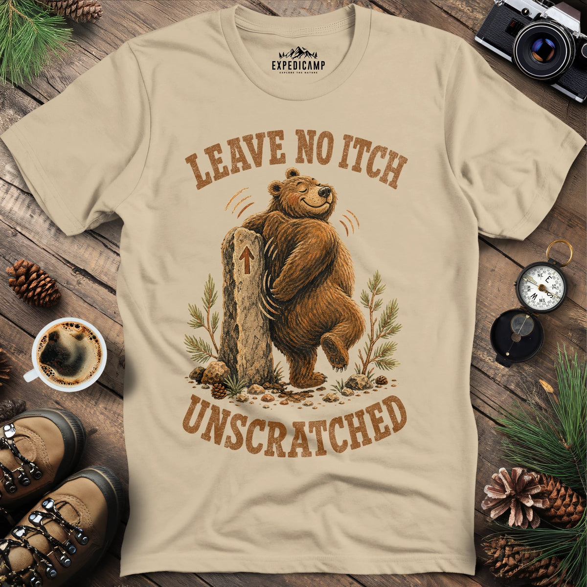 Never Trust a Downhill Hiker T-Shirt – Sand – Outdoor apparel for travel, hiking, camping, and nature lovers – ExpediCamp