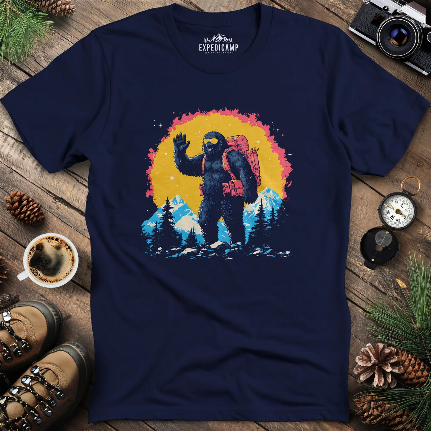 Bigfoot Waving T-Shirt – Friendly Sasquatch in the Mountains