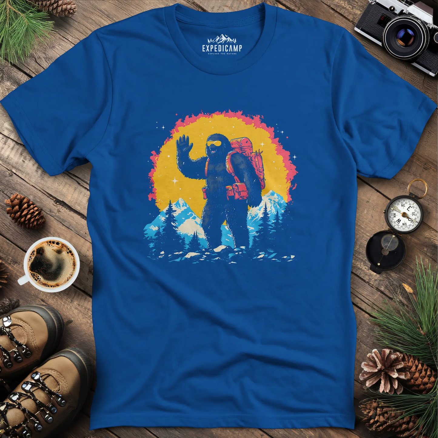 Bigfoot Waving T-Shirt – Friendly Sasquatch in the Mountains