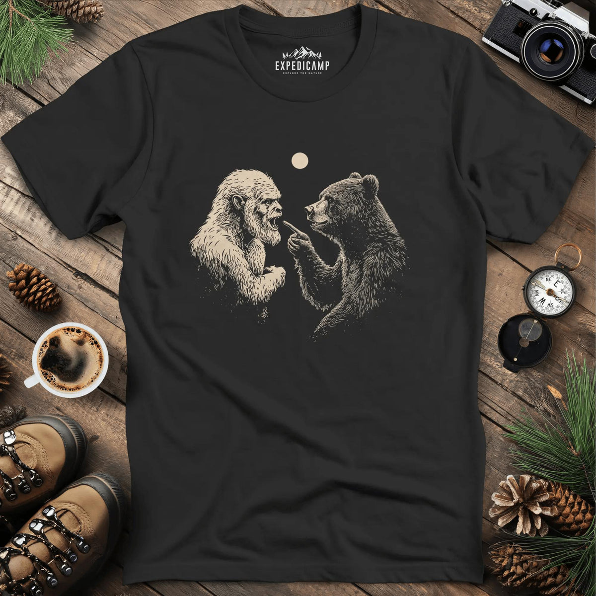 Bear and Bigfoot Argument T-Shirt – Wilderness Debate – Black – Outdoor apparel for travel, hiking, camping, and nature lovers – ExpediCamp