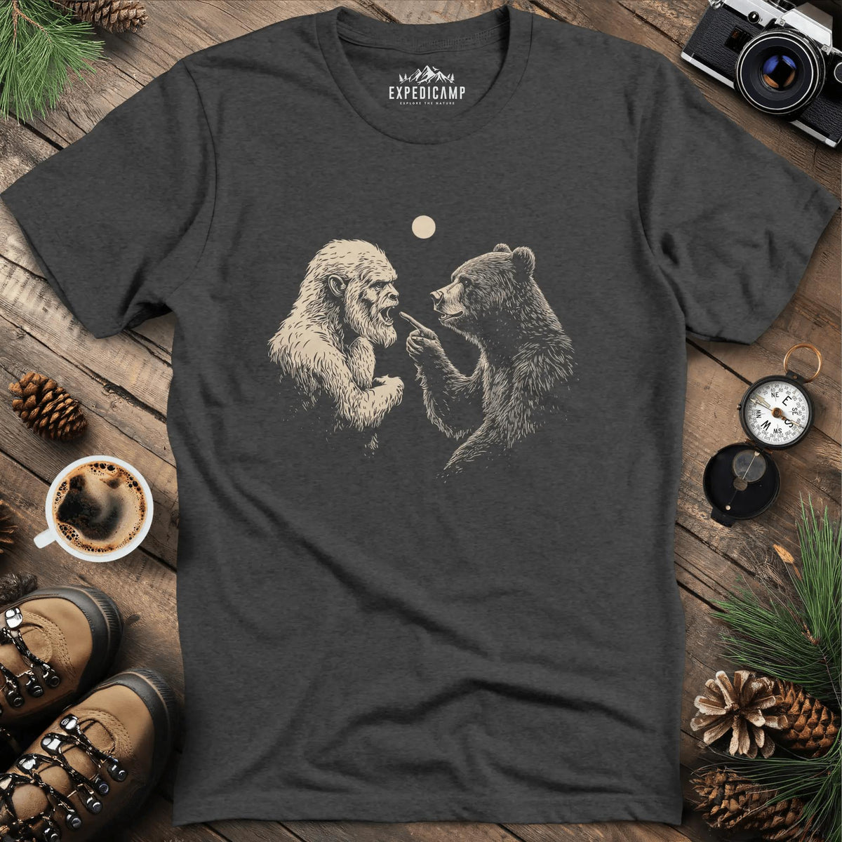 Bear and Bigfoot Argument T-Shirt – Wilderness Debate – Dark Heather – Outdoor apparel for travel, hiking, camping, and nature lovers – ExpediCamp