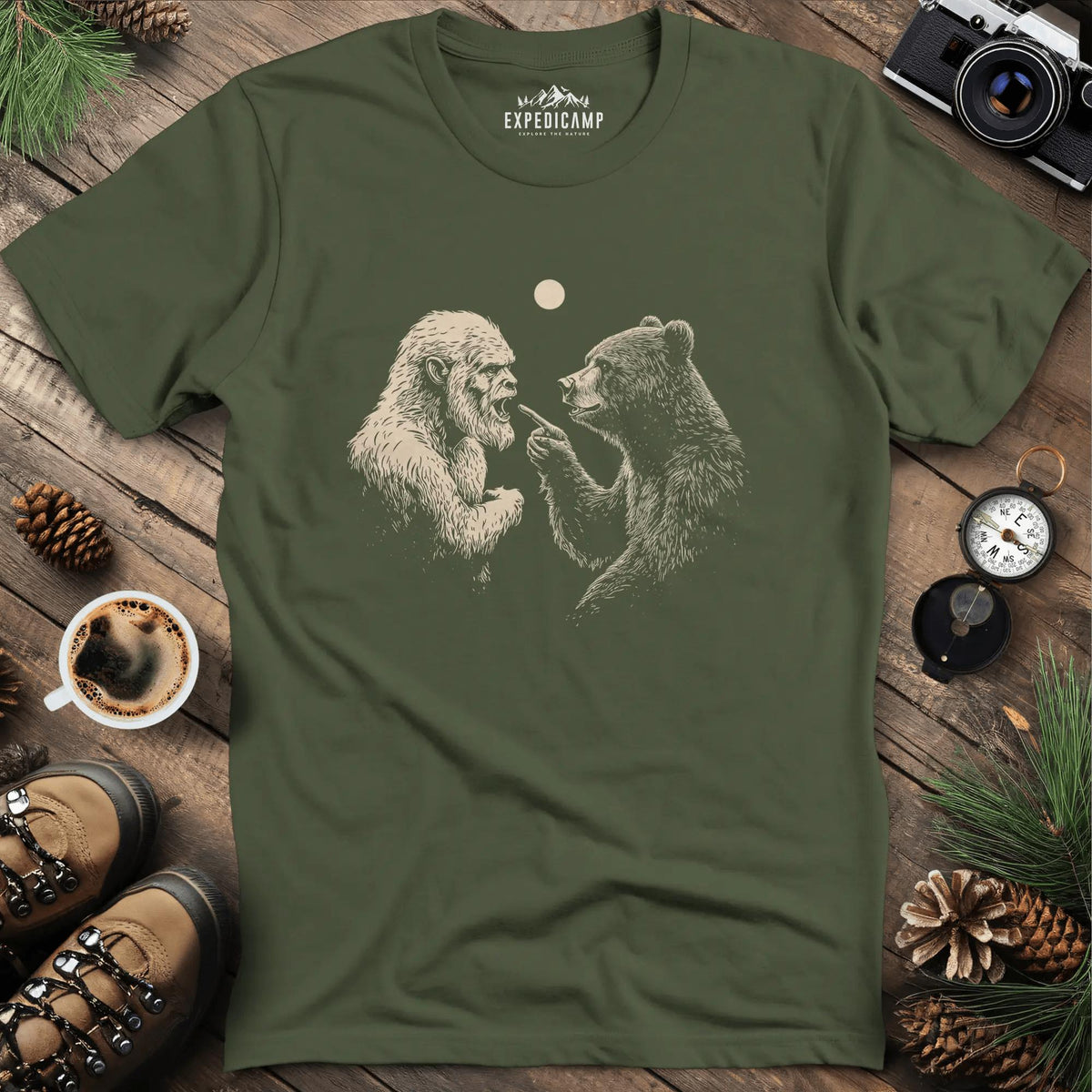 Bear and Bigfoot Argument T-Shirt – Wilderness Debate – Military Green – Outdoor apparel for travel, hiking, camping, and nature lovers – ExpediCamp