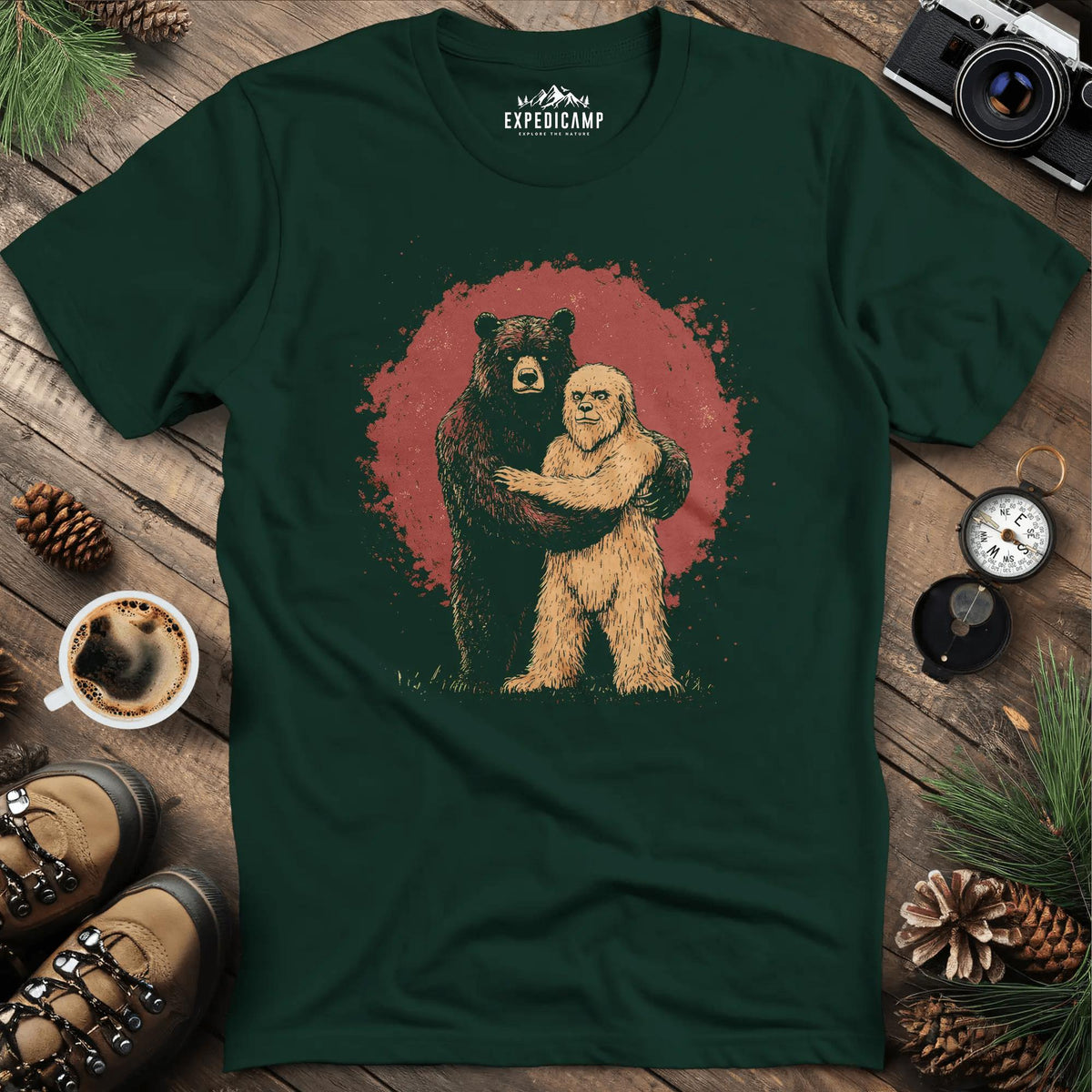 Bear Hugging Bigfoot T-Shirt – Unlikely Wilderness Friendship – Forest Green – Outdoor apparel for travel, hiking, camping, and nature lovers – ExpediCamp