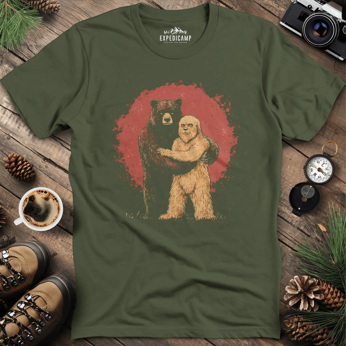 Bear Hugging Bigfoot T-Shirt – Unlikely Wilderness Friendship – Military Green – Outdoor apparel for travel, hiking, camping, and nature lovers – ExpediCamp