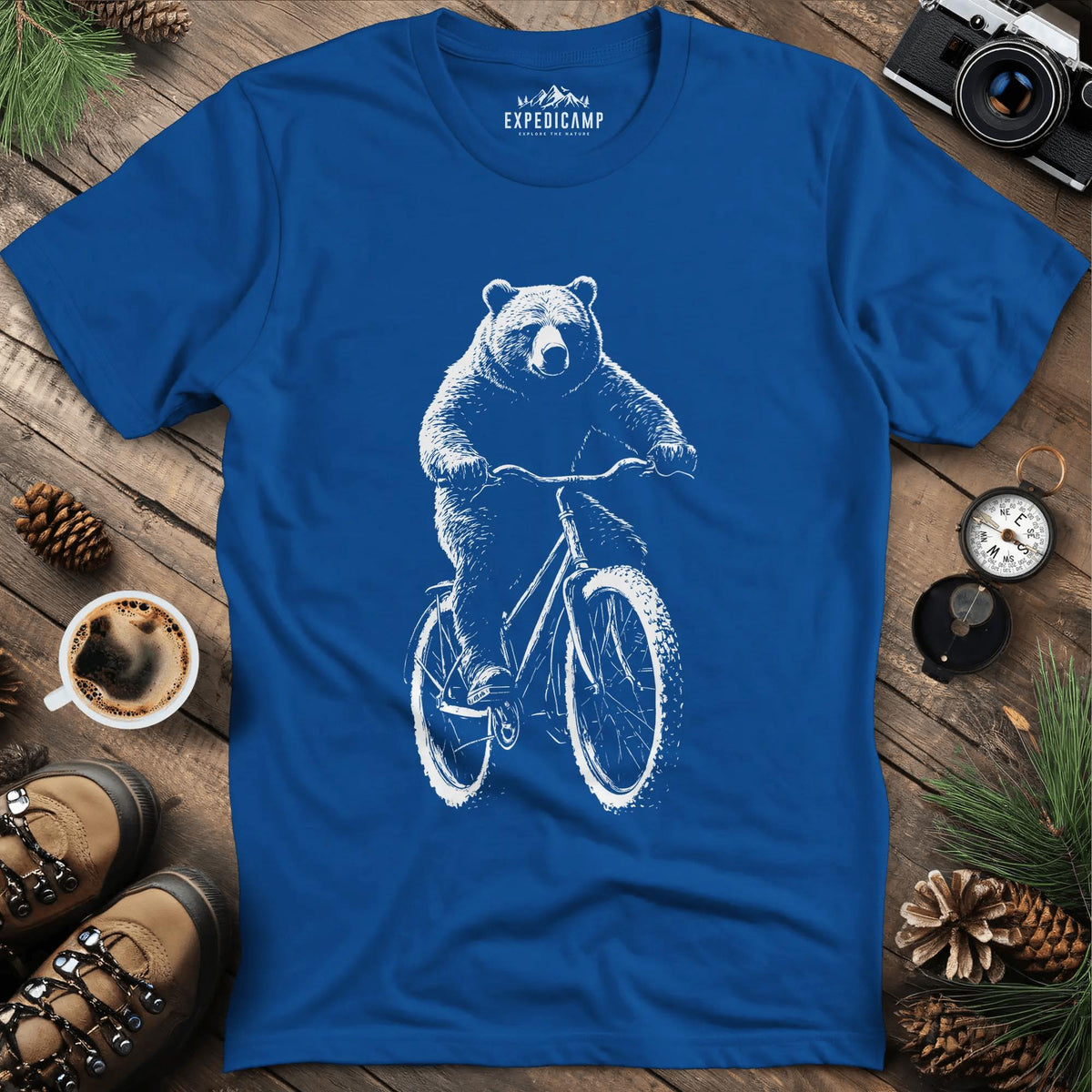 Bear on a Bike T-Shirt – Royal – Outdoor apparel for travel, hiking, camping, and nature lovers – ExpediCamp