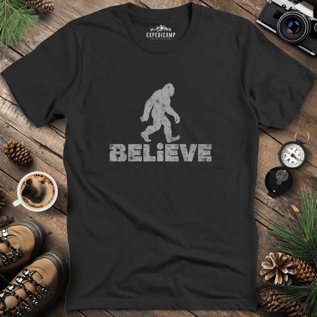 Believe Bigfoot T-Shirt – Black – Outdoor apparel for travel, hiking, camping, and nature lovers – ExpediCamp