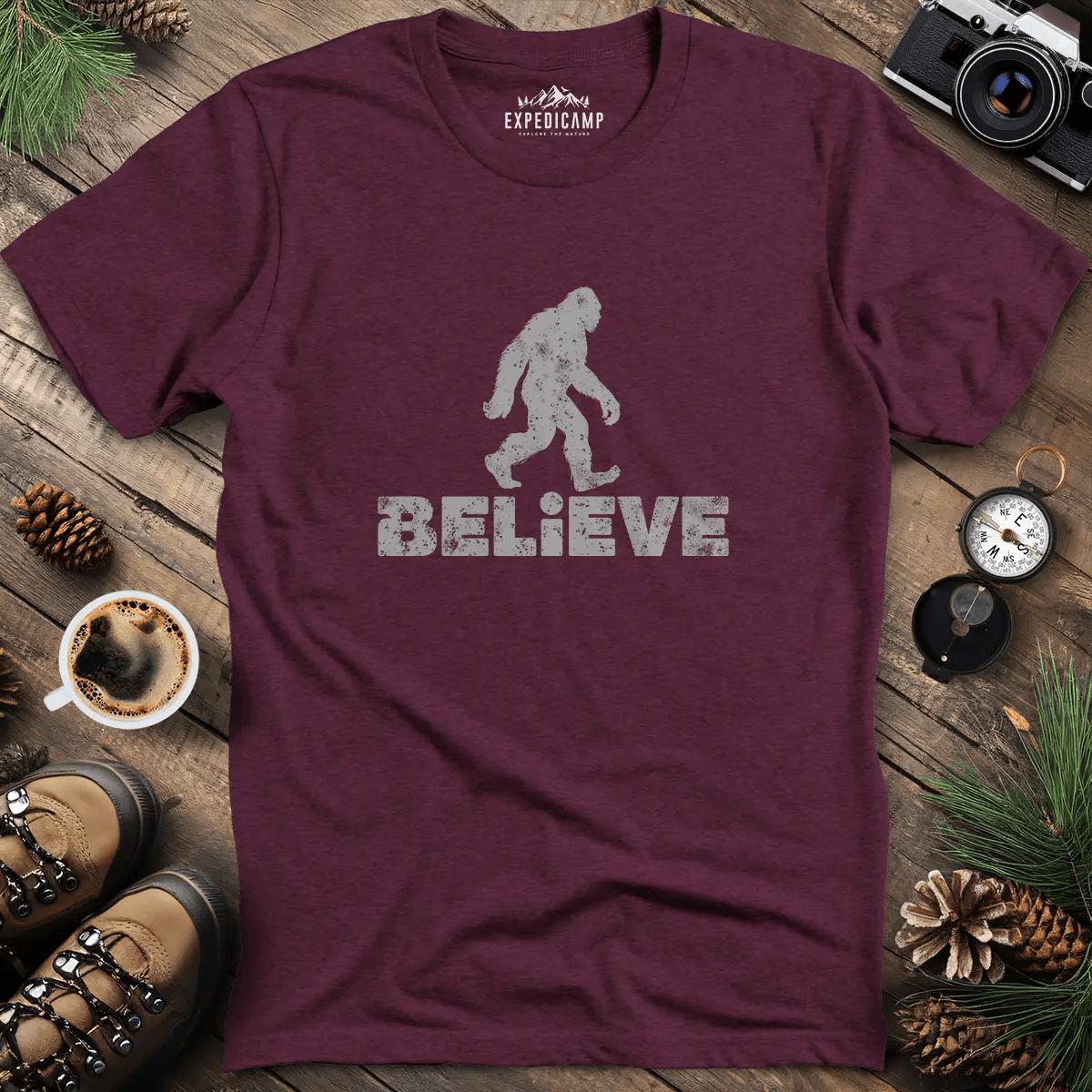 Believe Bigfoot T-Shirt – Heather Maroon – Outdoor apparel for travel, hiking, camping, and nature lovers – ExpediCamp