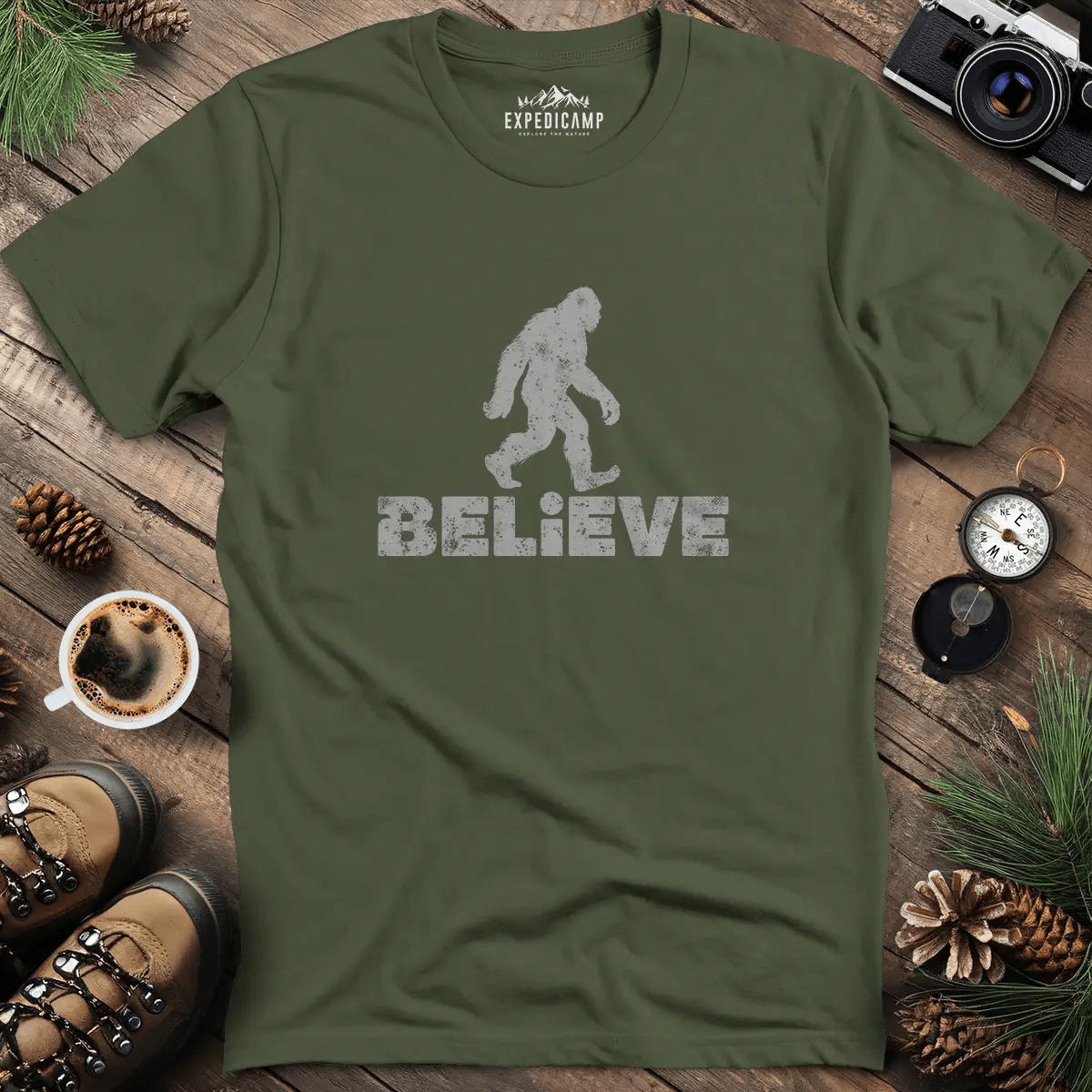 Believe Bigfoot T-Shirt – Military Green – Outdoor apparel for travel, hiking, camping, and nature lovers – ExpediCamp
