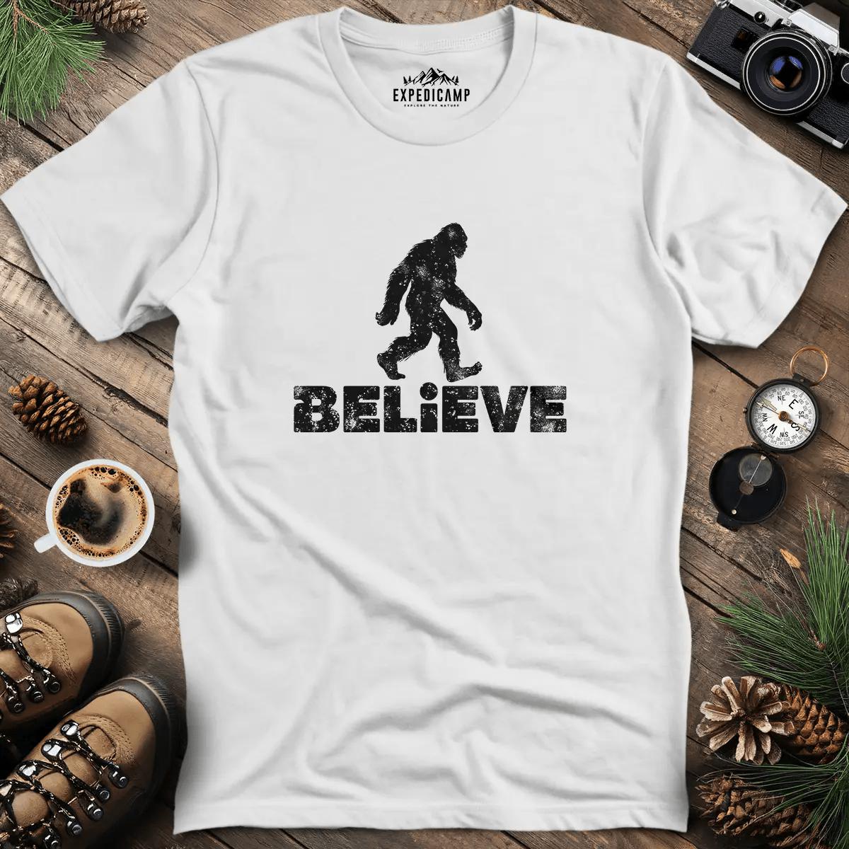 Believe Bigfoot T-Shirt – White – Outdoor apparel for travel, hiking, camping, and nature lovers – ExpediCamp