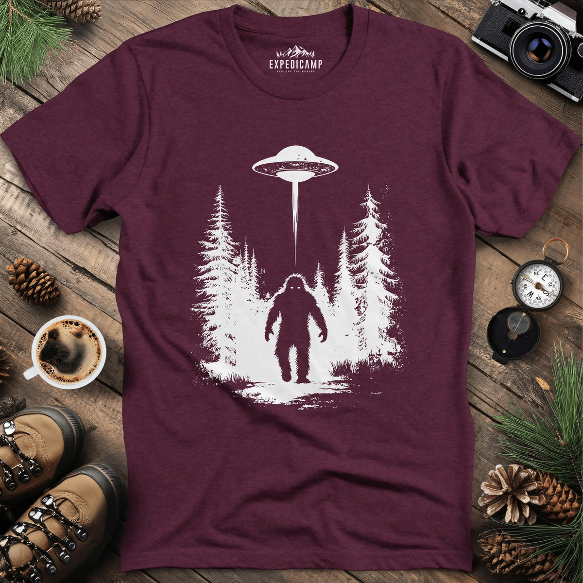 Bigfoot and UFO Encounter T-Shirt – Heather Maroon – Outdoor apparel for travel, hiking, camping, and nature lovers – ExpediCamp