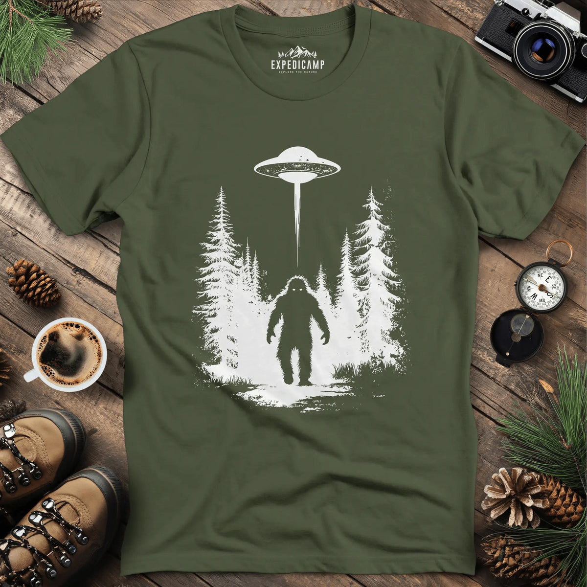 Bigfoot and UFO Encounter T-Shirt – Military Green – Outdoor apparel for travel, hiking, camping, and nature lovers – ExpediCamp