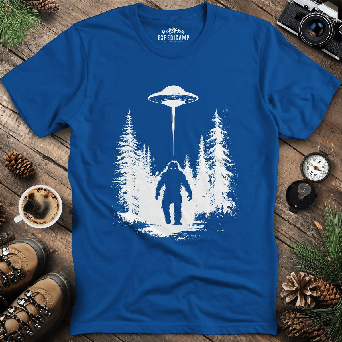 Bigfoot and UFO Encounter T-Shirt – Royal – Outdoor apparel for travel, hiking, camping, and nature lovers – ExpediCamp