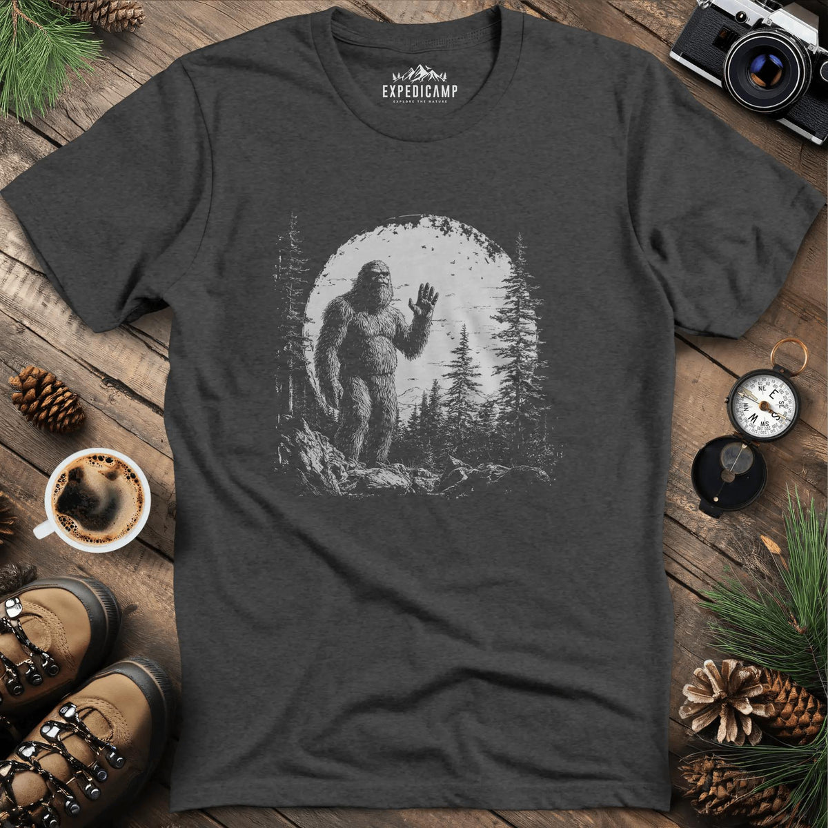 Bigfoot Hiding in the Mountains T-Shirt – Mysterious Bigfoot Wilderness Design – Dark Heather – Outdoor apparel for travel, hiking, camping, and nature lovers – ExpediCamp