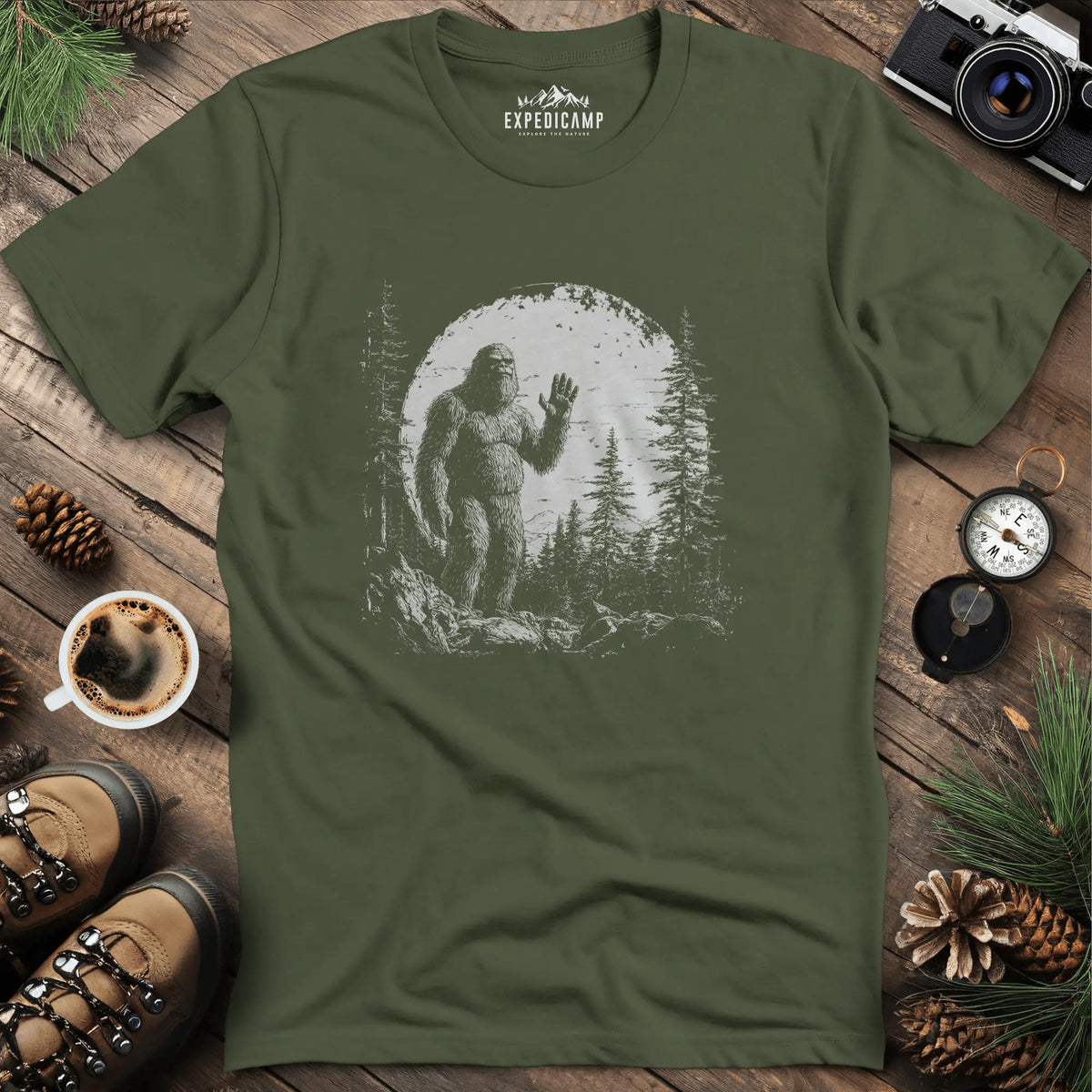 Bigfoot Hiding in the Mountains T-Shirt – Mysterious Bigfoot Wilderness Design – Military Green – Outdoor apparel for travel, hiking, camping, and nature lovers – ExpediCamp