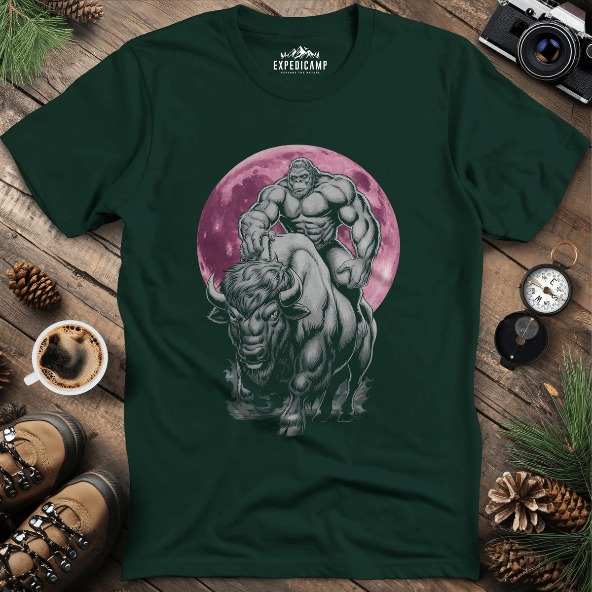 Bigfoot Riding Bison Pink Moon T-Shirt – Forest Green – Outdoor apparel for travel, hiking, camping, and nature lovers – ExpediCamp