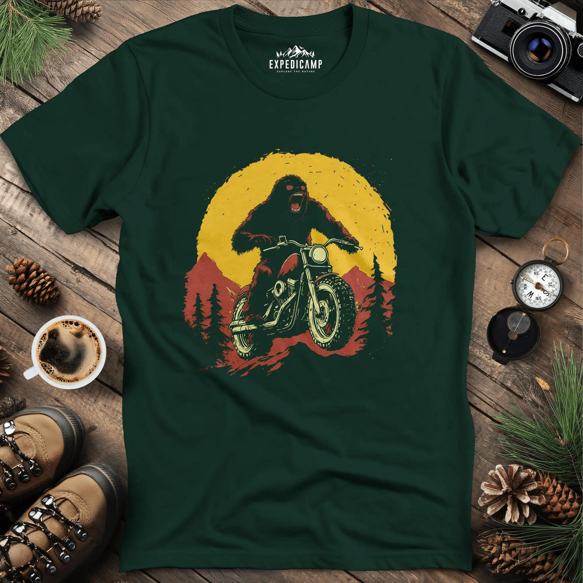 Bigfoot Riding Motorcycle T-Shirt – Bigfoot on the Open Road – Forest Green – Outdoor apparel for travel, hiking, camping, and nature lovers – ExpediCamp