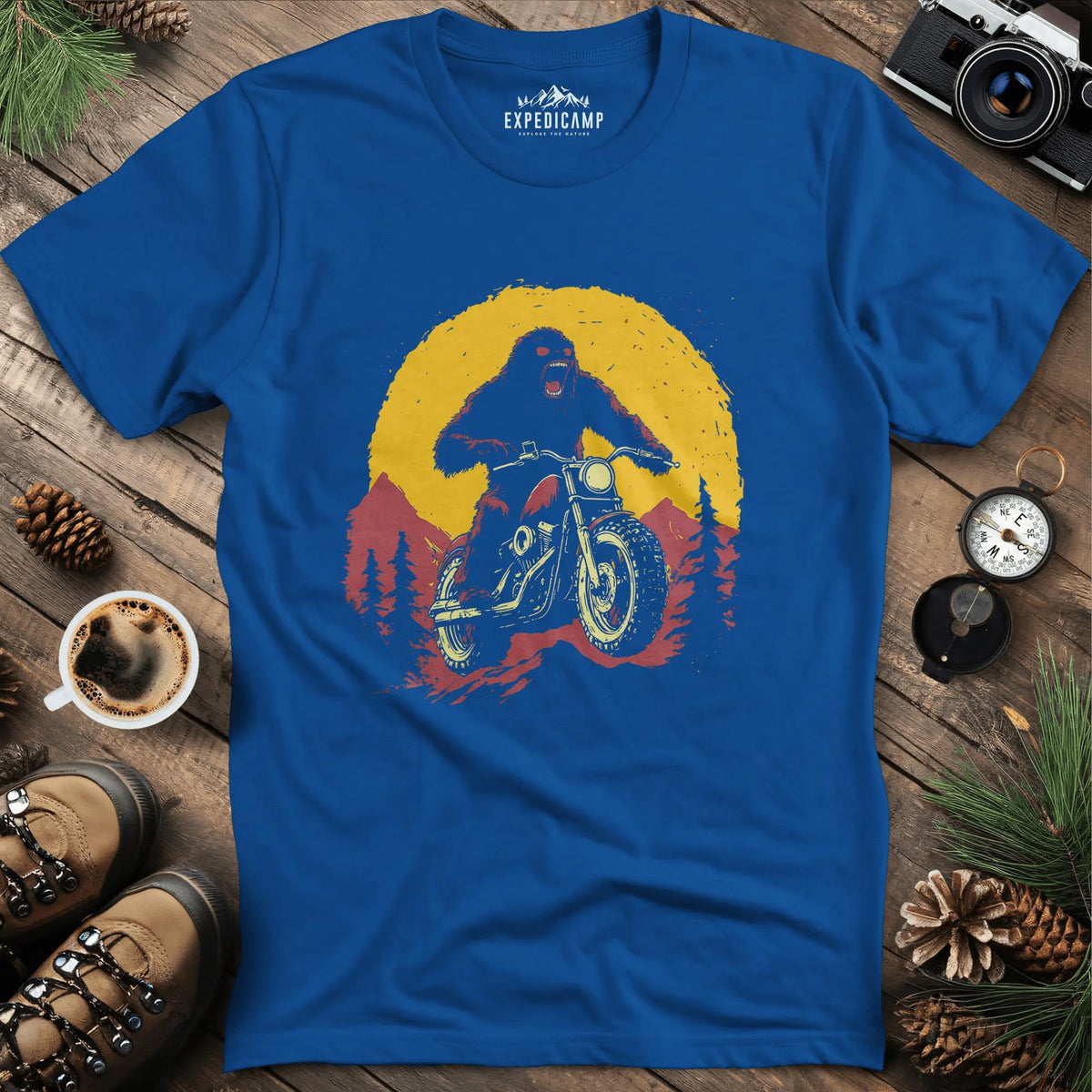 Bigfoot Riding Motorcycle T-Shirt – Bigfoot on the Open Road – Royal – Outdoor apparel for travel, hiking, camping, and nature lovers – ExpediCamp