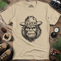 Bigfoot Sasquatch Silhouette Ranger T-Shirt – Sand – Outdoor apparel for travel, hiking, camping, and nature lovers – ExpediCamp