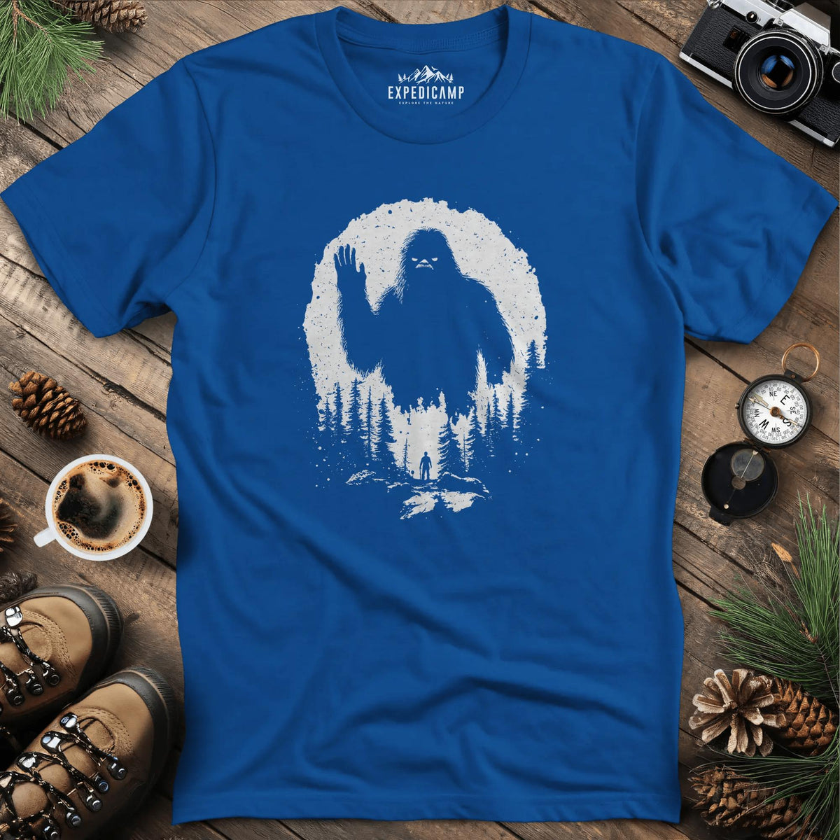 Bigfoot T-Shirt – Mysterious Adventure in the Wild Tee – Royal – Outdoor apparel for travel, hiking, camping, and nature lovers – ExpediCamp
