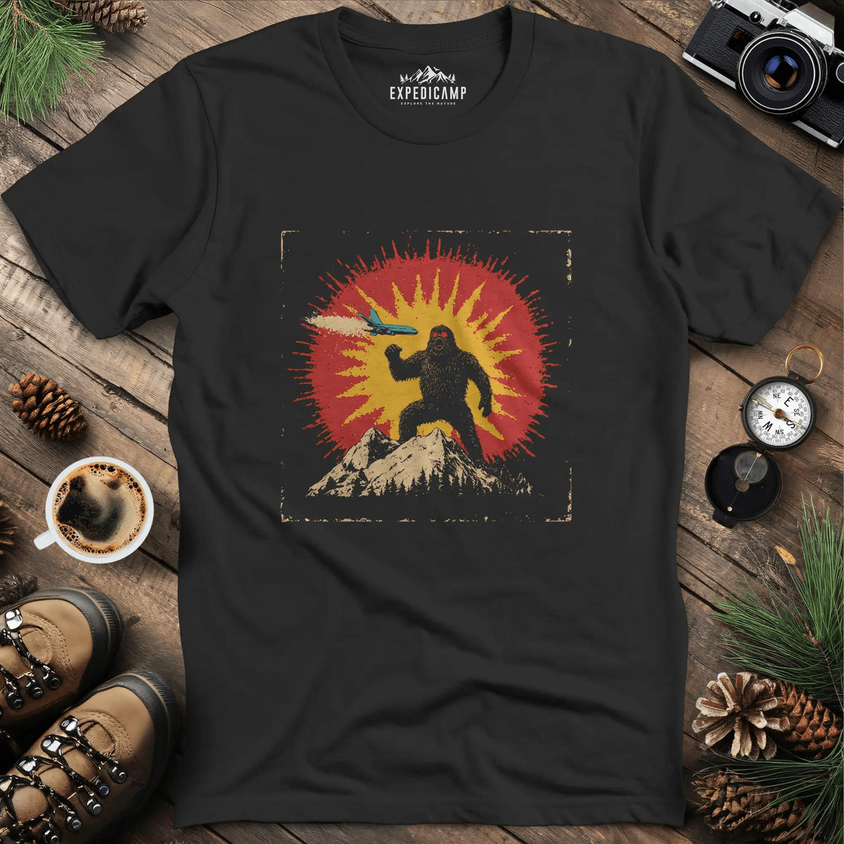 Bigfoot vs. The Skies T-Shirt – Black – Outdoor apparel for travel, hiking, camping, and nature lovers – ExpediCamp
