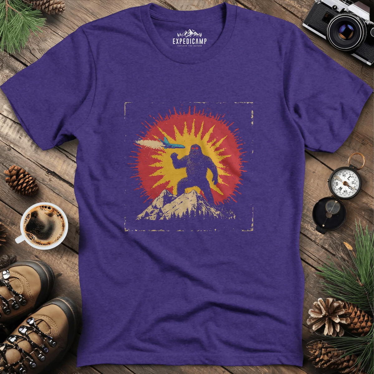 Bigfoot vs. The Skies T-Shirt – Heather Purple – Outdoor apparel for travel, hiking, camping, and nature lovers – ExpediCamp
