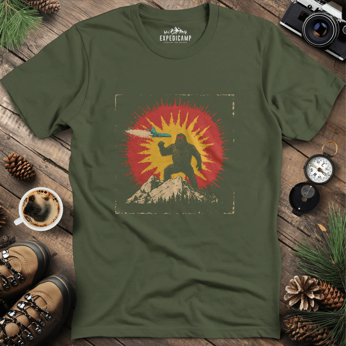 Bigfoot vs. The Skies T-Shirt – Military Green – Outdoor apparel for travel, hiking, camping, and nature lovers – ExpediCamp