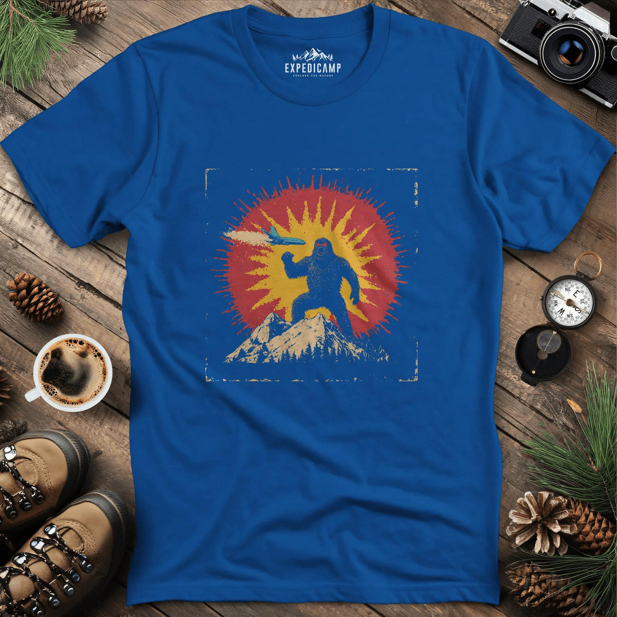 Bigfoot vs. The Skies T-Shirt – Royal – Outdoor apparel for travel, hiking, camping, and nature lovers – ExpediCamp