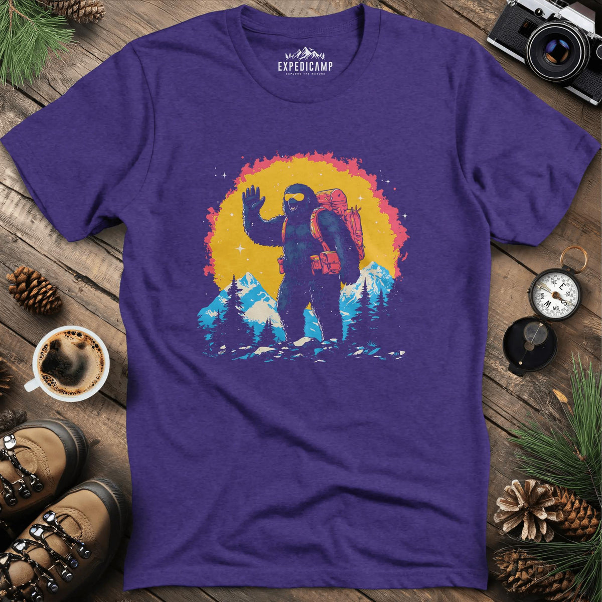 Bigfoot Waving T-Shirt – Friendly Sasquatch in the Mountains – Heather Purple – Outdoor apparel for travel, hiking, camping, and nature lovers – ExpediCamp