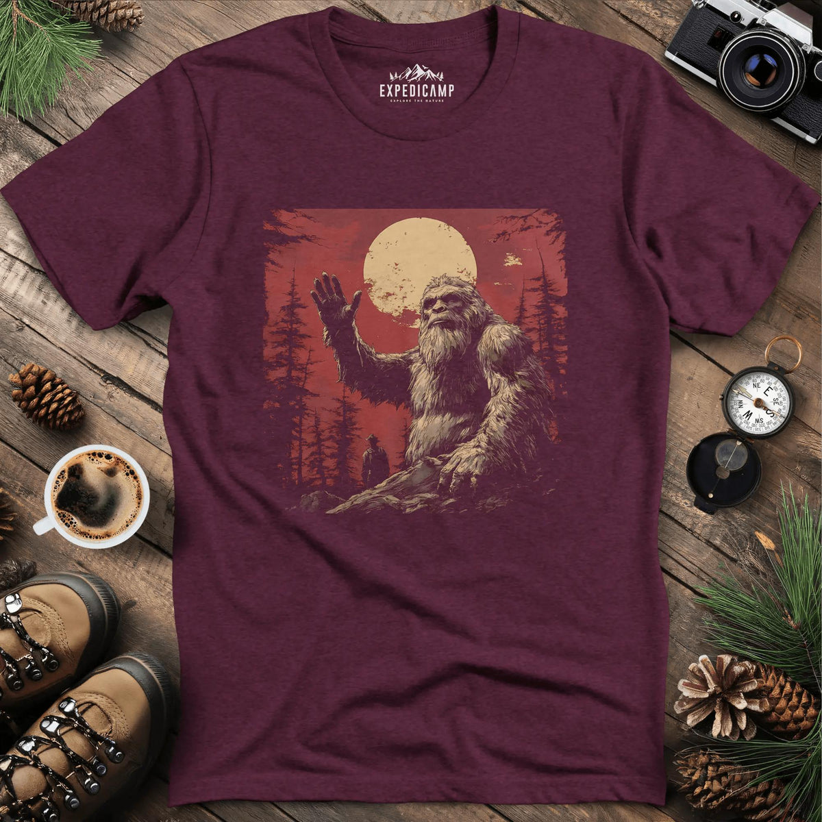 Bigfoot Waving T-Shirt – Friendly Sasquatch Under the Moon – Heather Maroon – Outdoor apparel for travel, hiking, camping, and nature lovers – ExpediCamp