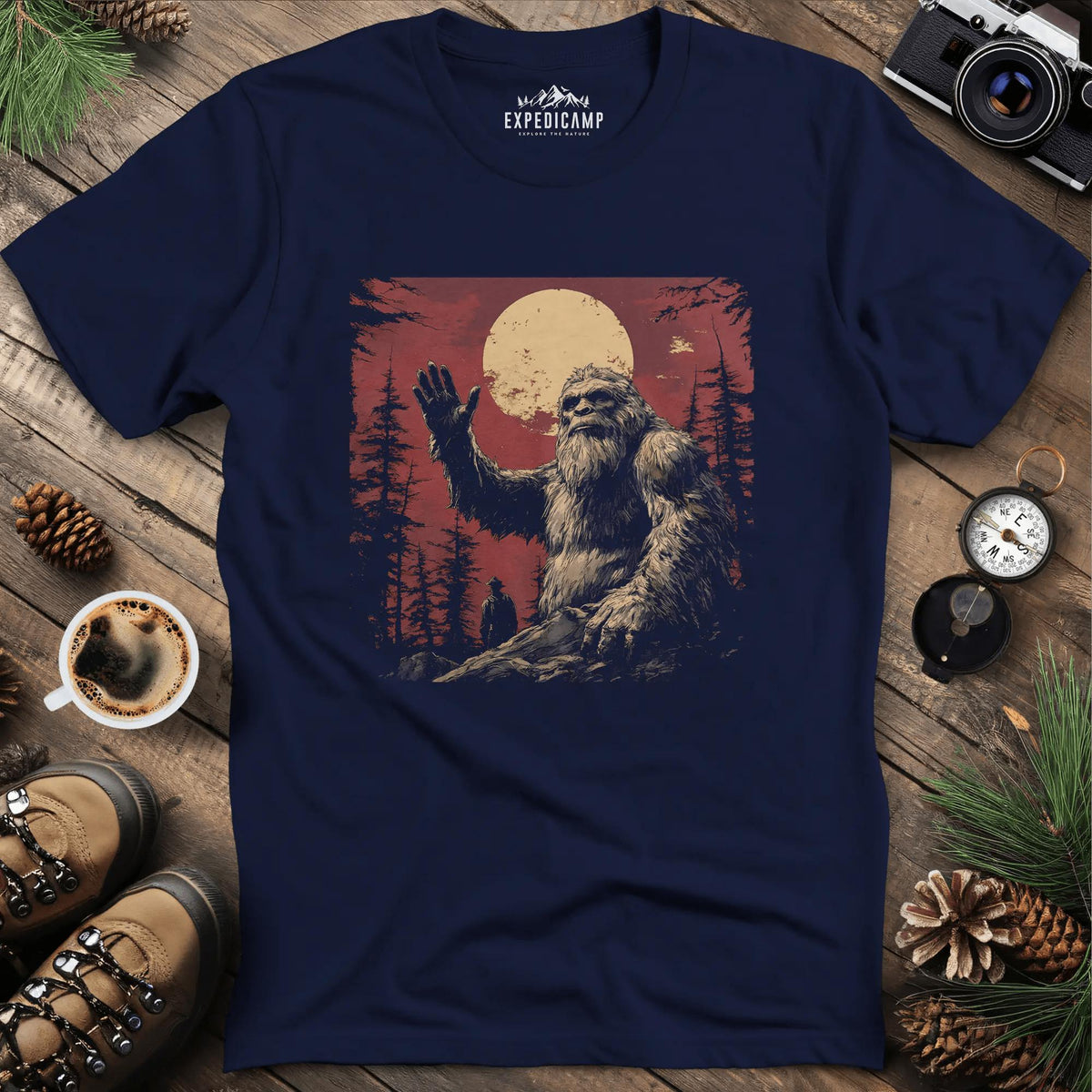 Bigfoot Waving T-Shirt – Friendly Sasquatch Under the Moon – Navy – Outdoor apparel for travel, hiking, camping, and nature lovers – ExpediCamp
