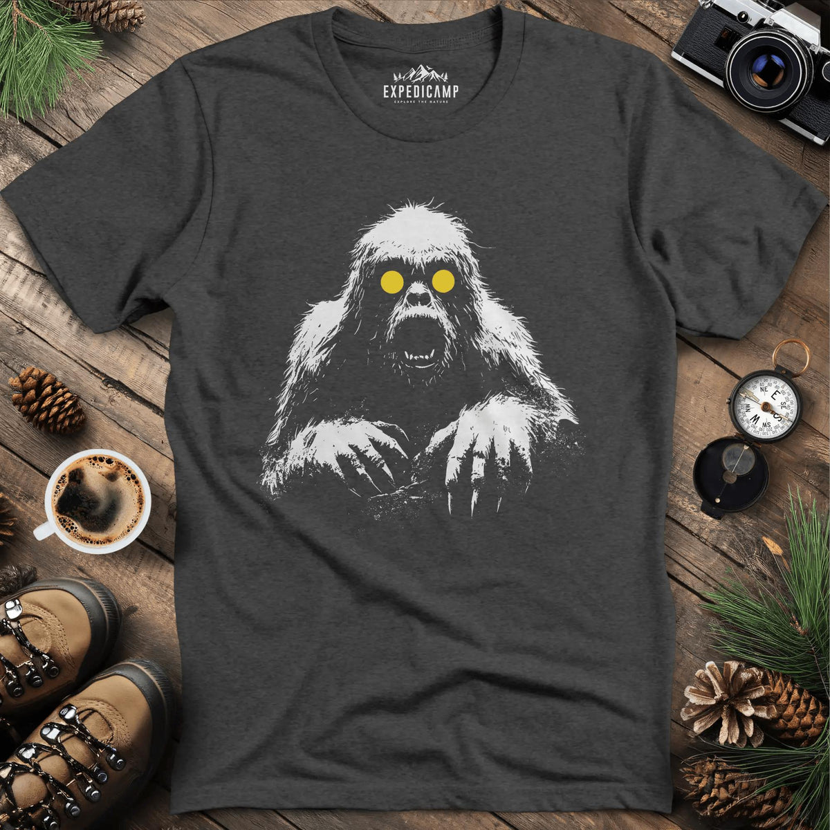 Bigfoot with Glowing Eyes T-Shirt – Mysterious Creature in the Dark – Dark Heather – Outdoor apparel for travel, hiking, camping, and nature lovers – ExpediCamp