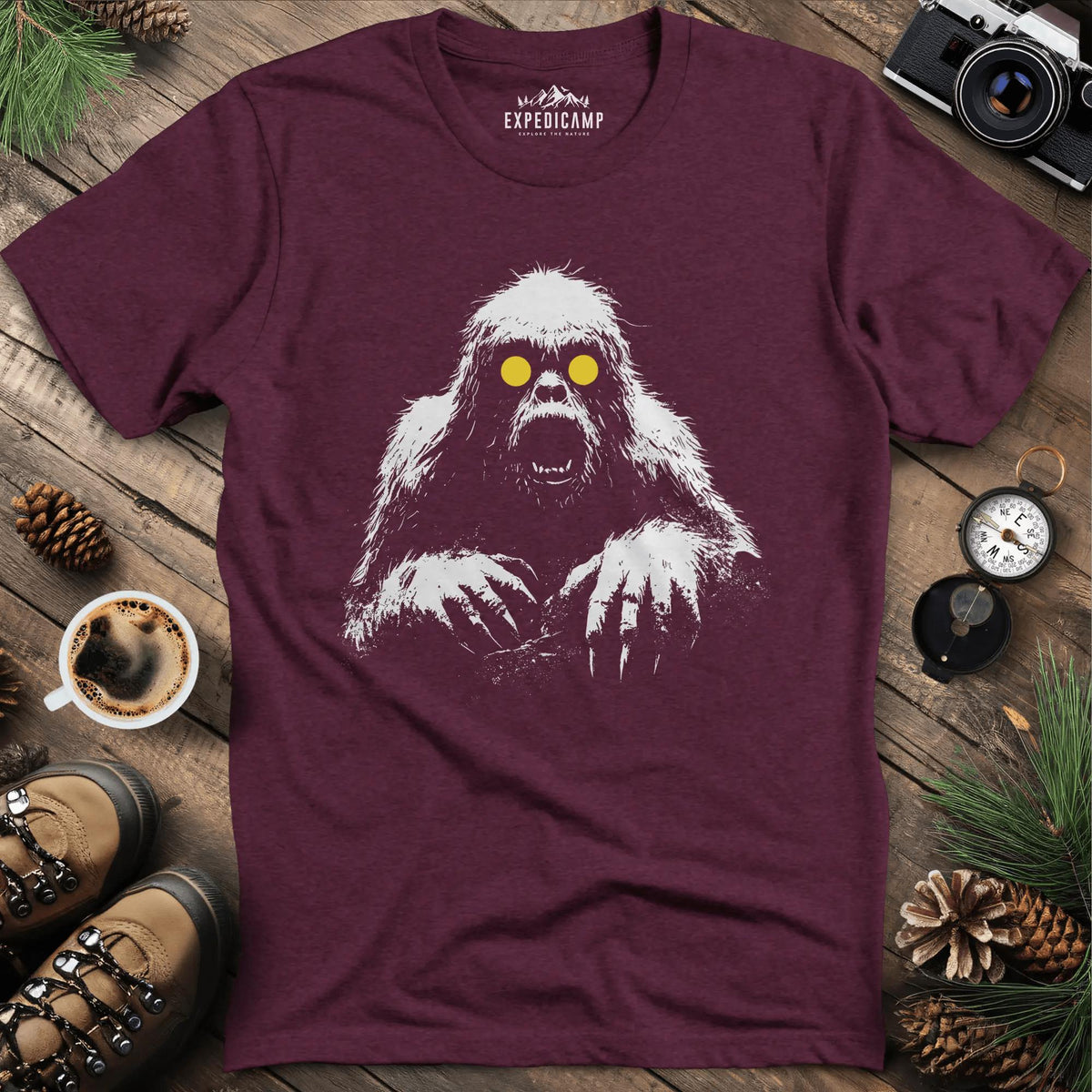 Bigfoot with Glowing Eyes T-Shirt – Mysterious Creature in the Dark – Heather Maroon – Outdoor apparel for travel, hiking, camping, and nature lovers – ExpediCamp