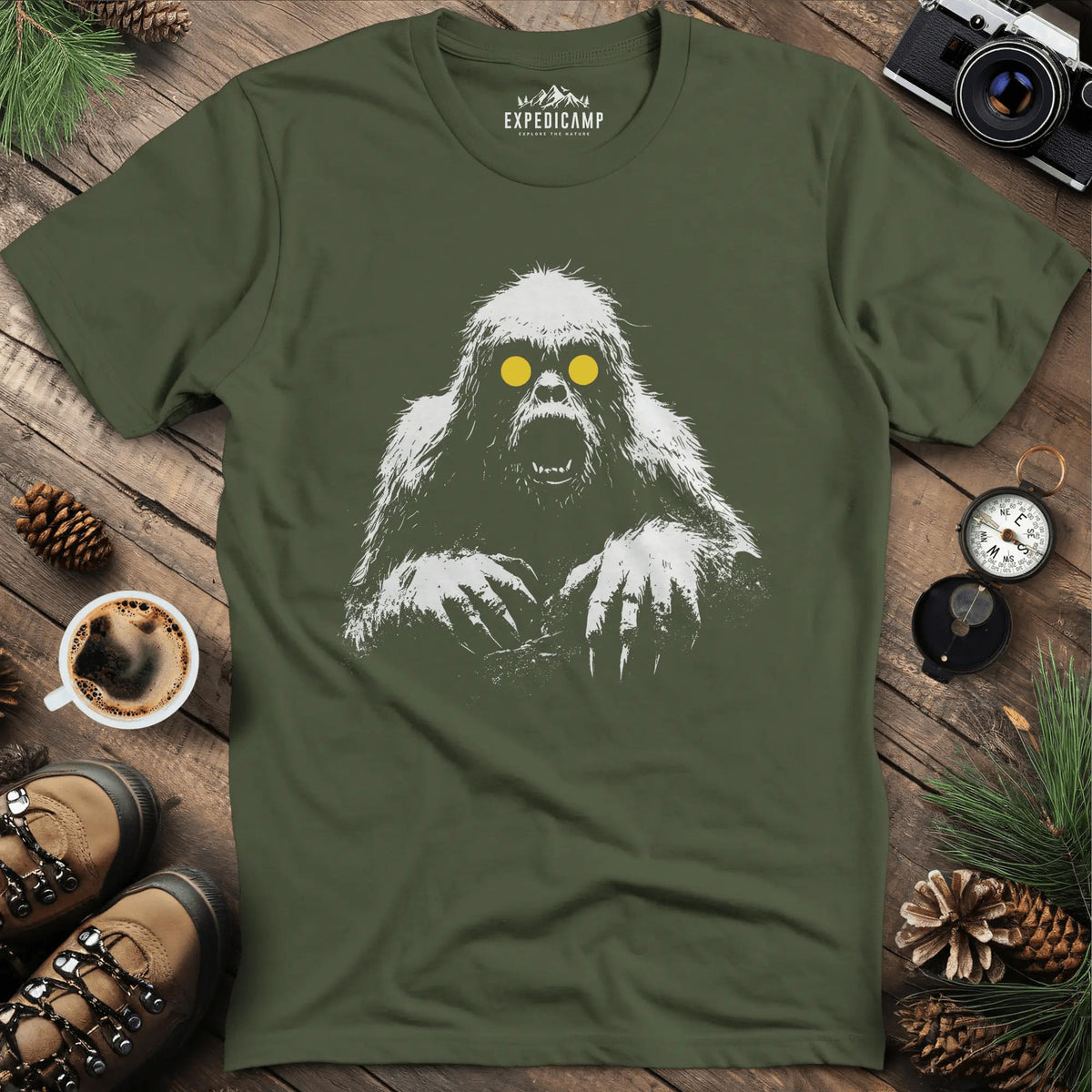 Bigfoot with Glowing Eyes T-Shirt – Mysterious Creature in the Dark – Military Green – Outdoor apparel for travel, hiking, camping, and nature lovers – ExpediCamp