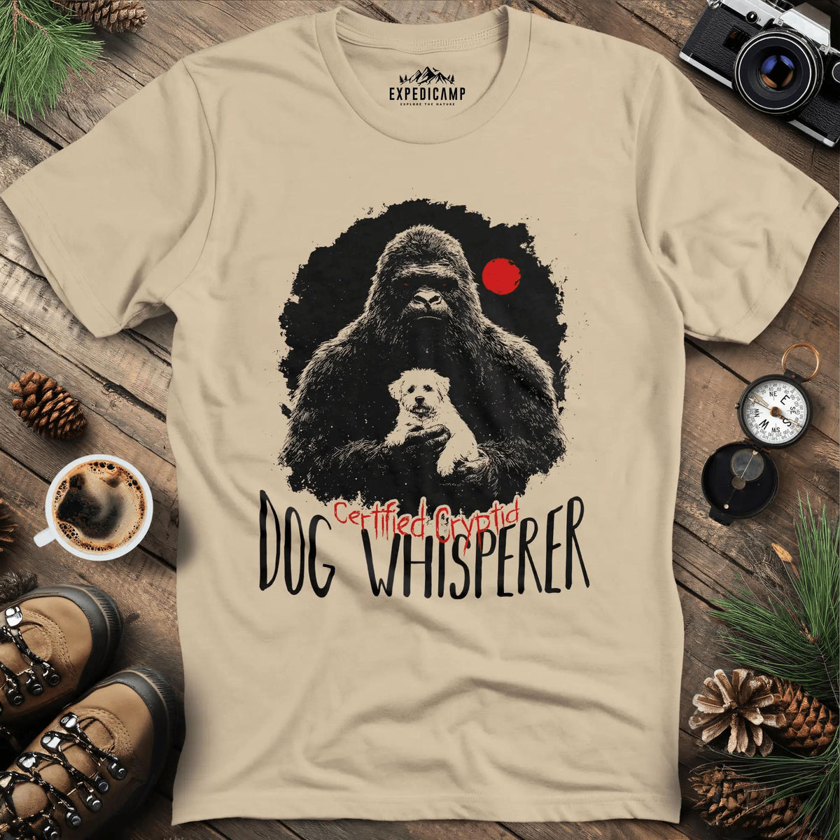 Certified Cryptid Dog Whisperer Bigfoot T-Shirt – Sand – Outdoor apparel for travel, hiking, camping, and nature lovers – ExpediCamp