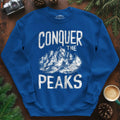 Conquer the Peaks Sweatshirt – Royal – Outdoor apparel for travel, hiking, camping, and nature lovers – ExpediCamp