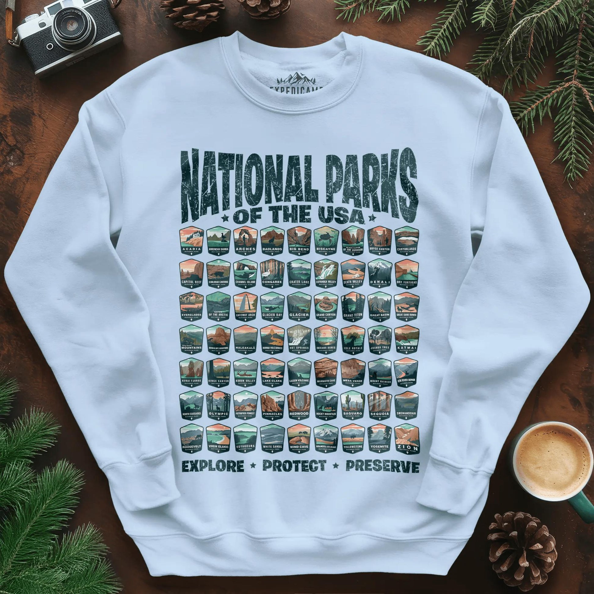 Explore All 63 National Parks of the USA Sweatshirt – Light Blue – Outdoor apparel for travel, hiking, camping, and nature lovers – ExpediCamp