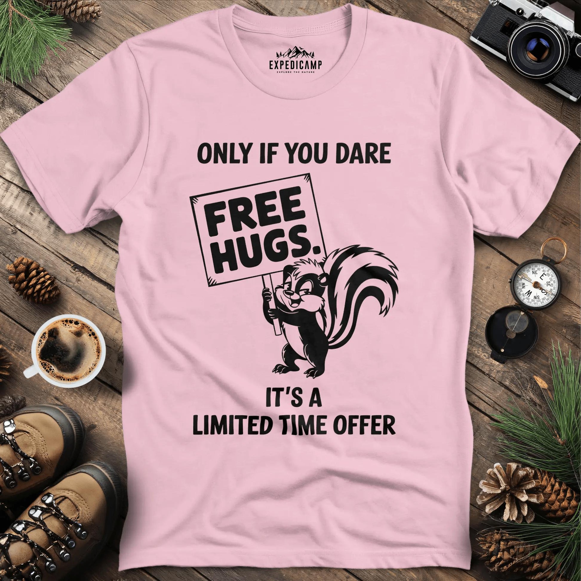 Free Hugs Skunk T-Shirt – Light Pink – Outdoor apparel for travel, hiking, camping, and nature lovers – ExpediCamp