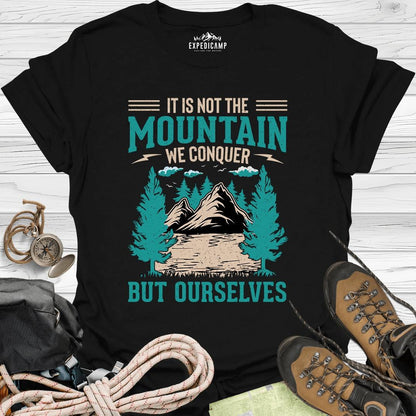 It Is Not The Mountain We Conquer But Ourselves T-Shirt – Black – Outdoor apparel for travel, hiking, camping, and nature lovers – ExpediCamp