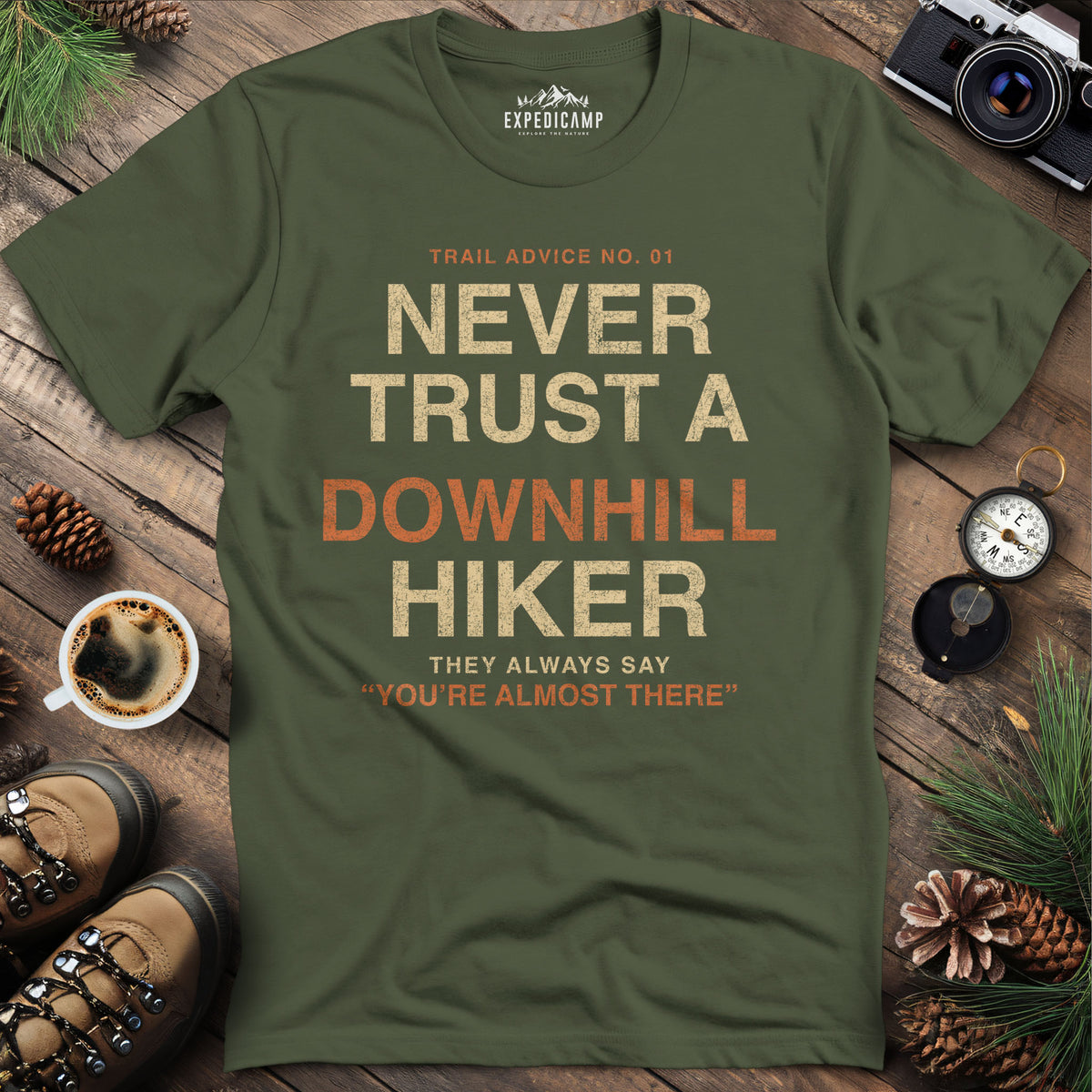 Never Trust a Downhill Hiker T-Shirt – Military Green – Outdoor apparel for travel, hiking, camping, and nature lovers – ExpediCamp