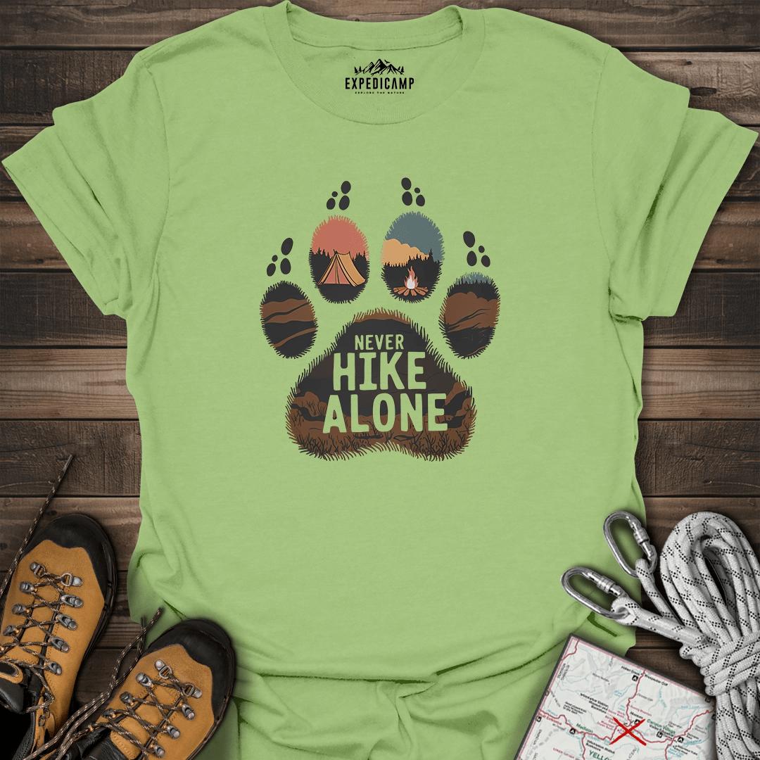Never Hike Alone T-Shirt – Kiwi – Outdoor apparel for travel, hiking, camping, and nature lovers – ExpediCamp