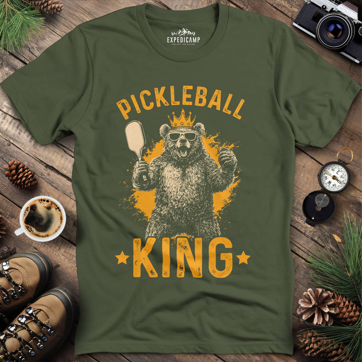 Pickleball King Bear T-Shirt – Military Green – Outdoor apparel for travel, hiking, camping, and nature lovers – ExpediCamp