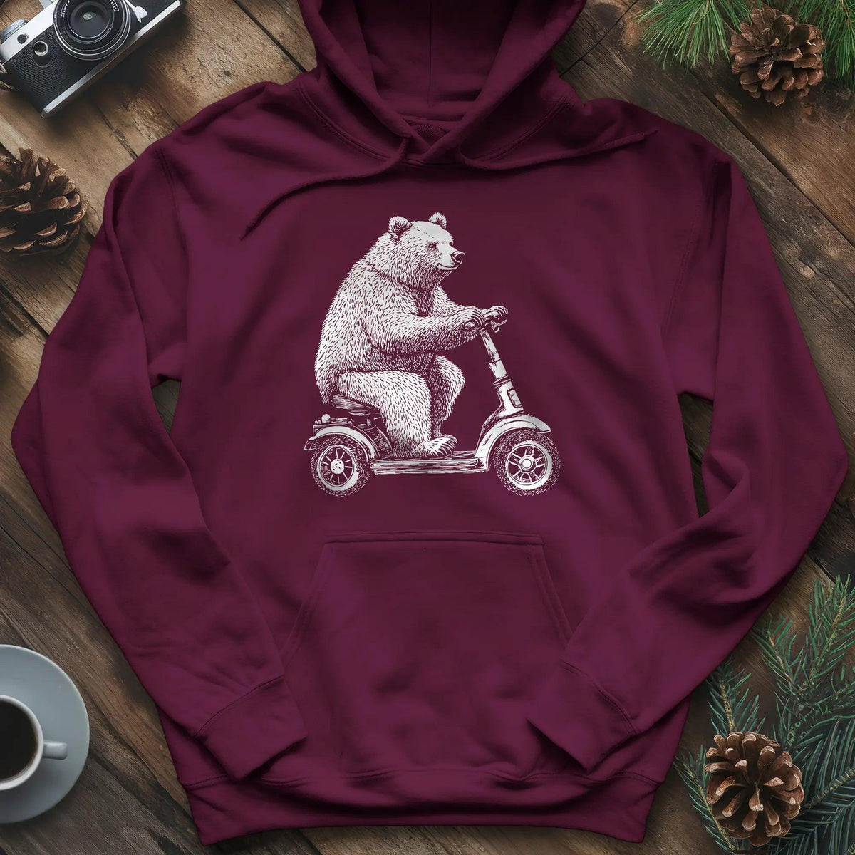 Scooting Bear Hoodie – Maroon – Outdoor apparel for travel, hiking, camping, and nature lovers – ExpediCamp