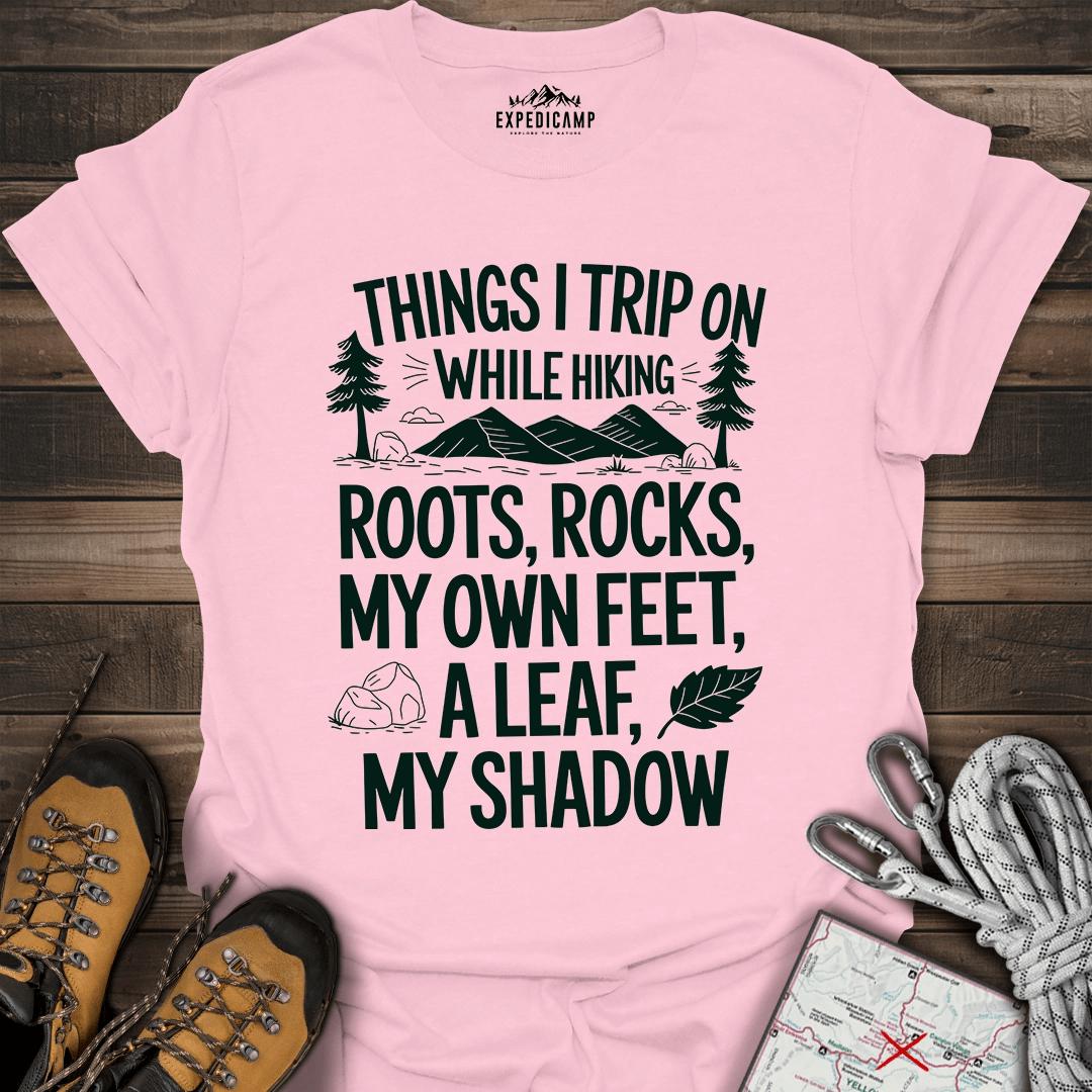 Things I Trip On While Hiking T-Shirt – Light Pink – Outdoor apparel for travel, hiking, camping, and nature lovers – ExpediCamp
